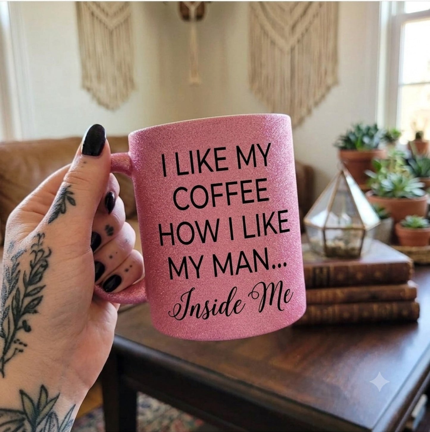 Pink coffee mug with the phrase I like my coffee how I like my man inside me