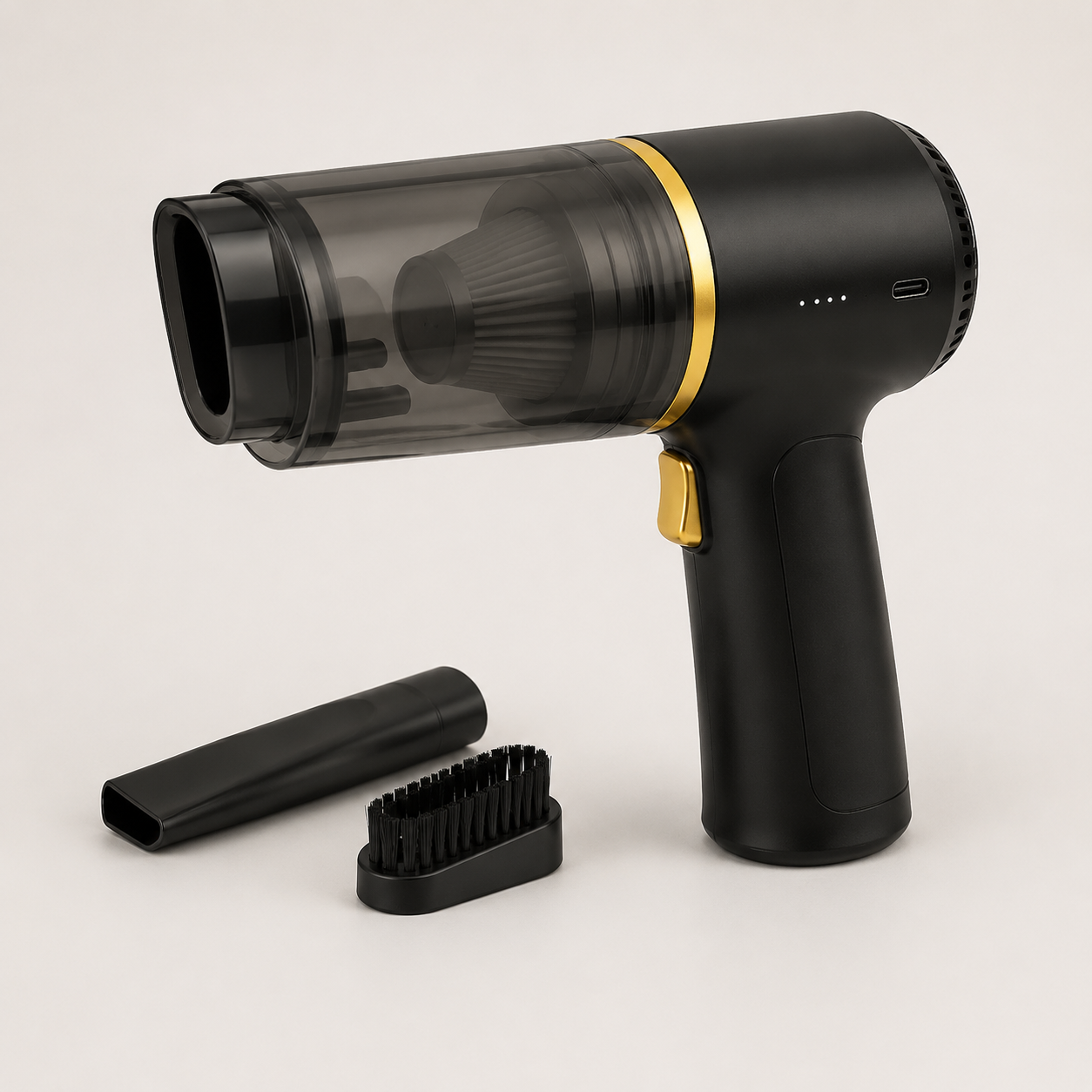 Black cordless handheld car vacuum with gold accents on a clean studio background
