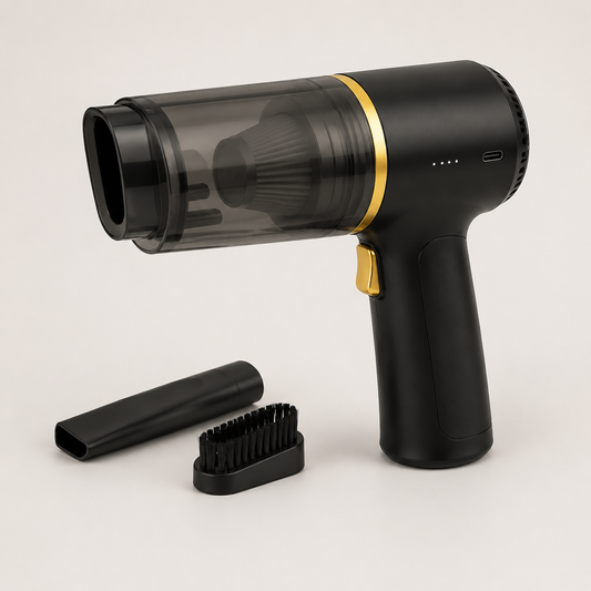 Black cordless handheld car vacuum with gold accents on a clean studio background