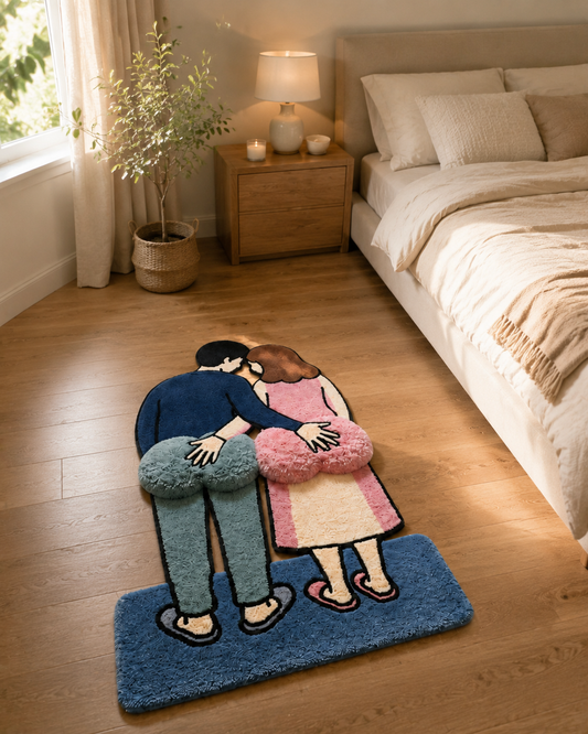 Plush illustrated couple rug styled beside a bed in a warm neutral bedroom